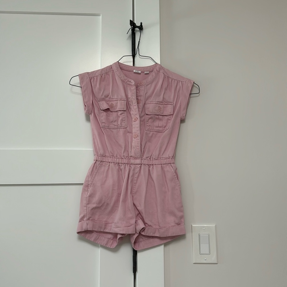 Pink romper with pockets. Elastic waist